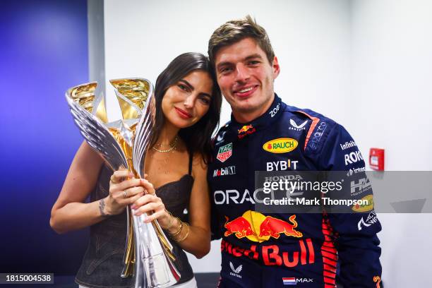 Race winner Max Verstappen of the Netherlands and Oracle Red Bull Racing and Kelly Piquet pose for a photo after the F1 Grand Prix of Abu Dhabi at...
