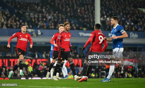 Marcus Rashford of Manchester United celebrates after scoring the team's second goal during the Premier League match between Everton FC and...
