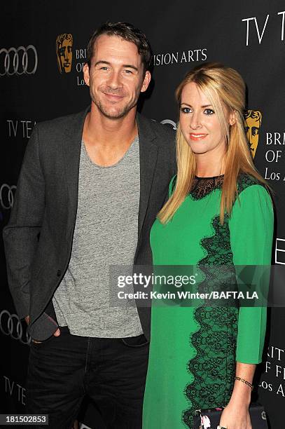 Actor Barry Sloane and Katy O'Grady attend the BAFTA LA TV Tea 2013 presented by BBC America and Audi held at the SLS Hotel on September 21, 2013 in...