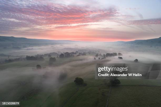 colourful sunrise over misty valley - north yorkshire dales stock pictures, royalty-free photos & images