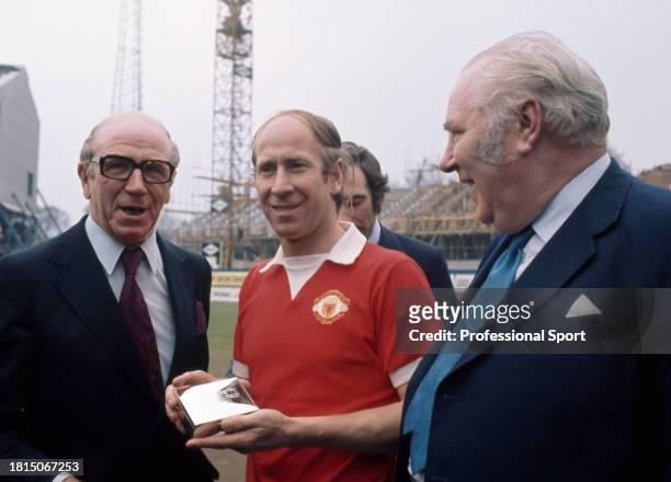 From left to right, Matt Busby , club director of Manchester United, Manchester United footballer Bobby Charlton and Louis Edwards , chairman of...