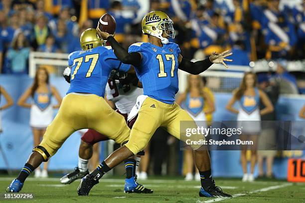 Quarterback Brett Hundley the UCLA Bruins throws a pass against the New Mexico State Aggies at the Rose Bowl on September 21, 2013 in Pasadena,...