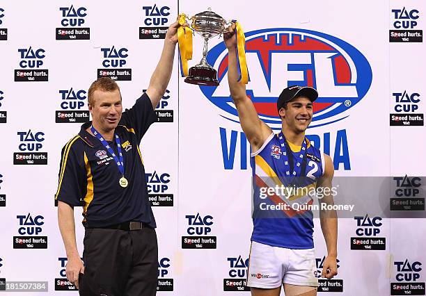 Ben Cavarra of the Bulldogs reacts after kicking a goal during the Round 12  AFL match between the Western Bulldogs and Adelaide Crows at Metricon  Stadium on the Gold Coast, Sunday, August