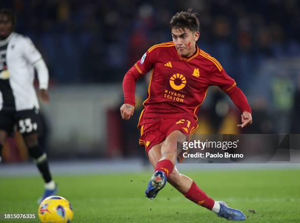 Paulo Dybala of AS Roma scores the team's second goal during the Serie A TIM match between AS Roma and Udinese Calcio at Stadio Olimpico on November...