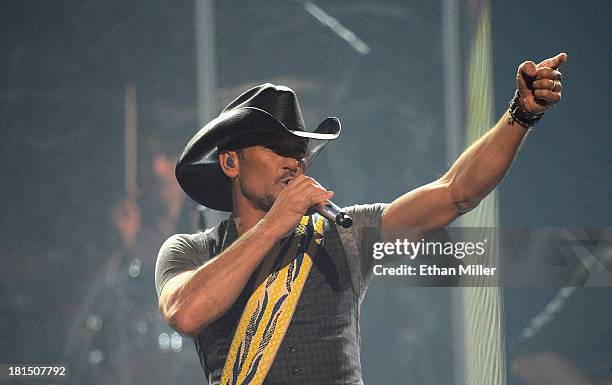 Singer/songwriter Tim McGraw performs onstage during the iHeartRadio Music Festival at the MGM Grand Garden Arena on September 21, 2013 in Las Vegas,...