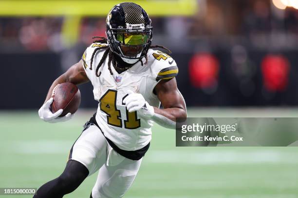 Alvin Kamara of the New Orleans Saints runs with the ball after a reception in the first quarter of the game against the Atlanta Falcons at...