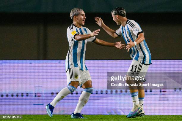 Santiago Lopez of Argentina celebrating his goal with his teammate Ian Subiabre during FIFA U-17 World Cup Round of 16 match between Argentina and...