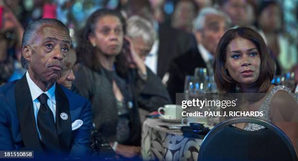 The Rev. Al Sharpton 58-yrs and his girlfriend Aisha McShaw, 35-yrs, listen to US President Barack Obama deliver remarks at the Congressional Black...