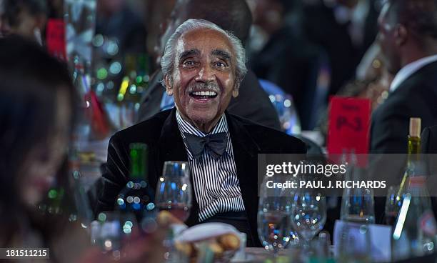 Rep. Charlie Rangel listens to US President Barack Obama deliver remarks at the Congressional Black Caucus Foundation, Inc. Annual Phoenix Awards...