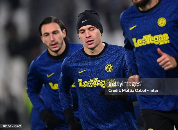 Nicolo Barella of FC Internazionale warms up ahead before the Serie A TIM match between Juventus and FC Internazionale at on November 26, 2023 in...