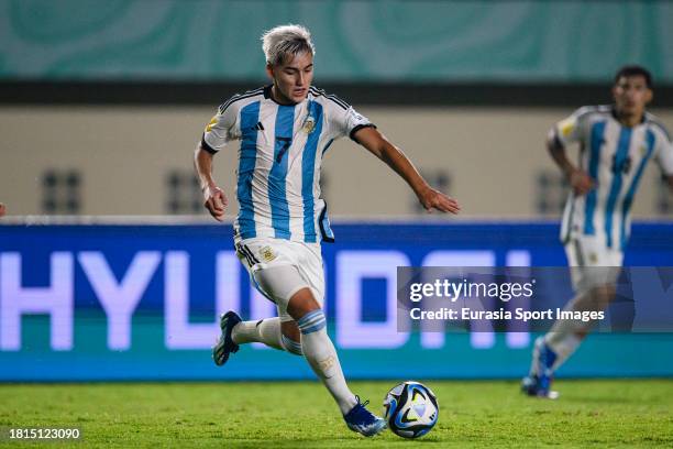 Ian Subiabre of Argentina runs with the ball during FIFA U-17 World Cup Round of 16 match between Argentina and Venezuela at Si Jalak Harupat Stadium...