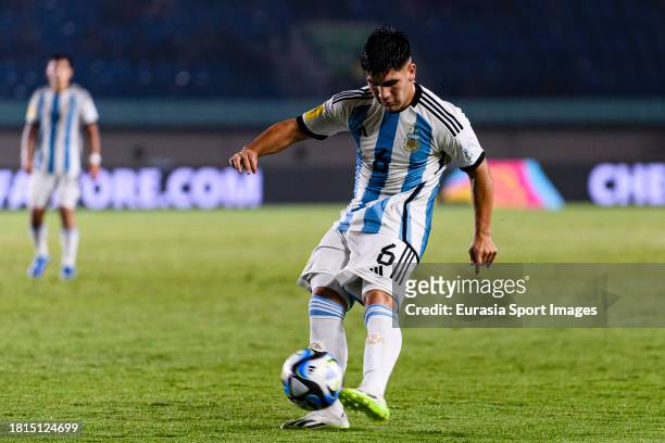 Juan Villalba of Argentina looks to bring the ball down during FIFA U-17 World Cup Round of 16 match between Argentina and Venezuela at Si Jalak...