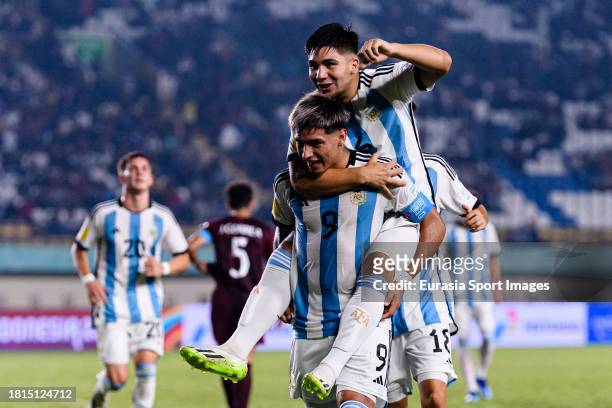 Agustin Ruberto of Argentina celebrates his second goal with his teammate Juan Villalba during FIFA U-17 World Cup Round of 16 match between...