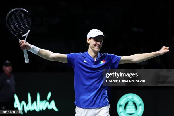 Jannik Sinner of Italy celebrates winning match point during the Davis Cup Final match against Alex De Minaur of Australia at Palacio de Deportes...