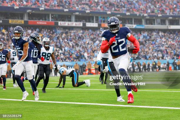 Derrick Henry of the Tennessee Titans scores a rushing touchdown during the second quarter against the Carolina Panthers at Nissan Stadium on...