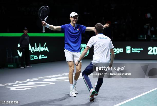 Jannik Sinner of Italy celebrates winning match point during the Davis Cup Final match against Alex De Minaur of Australia at Palacio de Deportes...