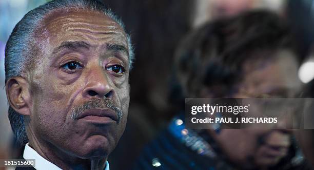 The Rev. Al Sharpton listens to US President Barack Obama deliver remarks at the Congressional Black Caucus Foundation, Inc. Annual Phoenix Awards...