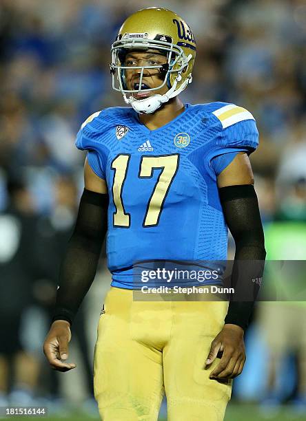 Quarterback Brett Hundley of the UCLA Bruins shouts to his teammates in the game against the New Mexico State Aggies at the Rose Bowl on September...