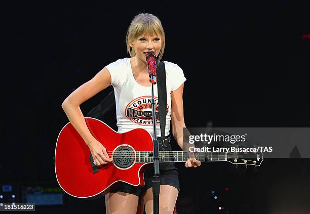 Taylor Swift wears a Country Music Hall of Fame t-shirt as she wraps the North American portion of her RED tour playing to a crowd of more than...