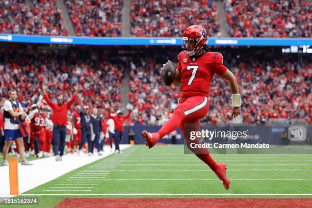 Stroud of the Houston Texans scores a rushing touchdown during the third quarter of a game against the Jacksonville Jaguars at NRG Stadium on...