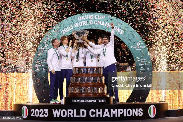 Filippo Volandri, Jannik Sinner, Lorenzo Musetti, Matteo Arnaldi, Lorenzo Sonego and Simone Bolelli of Italy lift the Davis Cup Trophy after their...