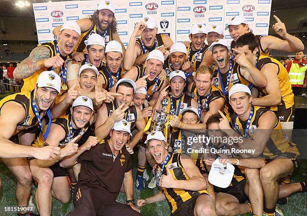 The Box Hill Hawks celebrate with the Premiership Cup after winning the VFL Grand Final match between the Box Hill Hawks and the Geelong Cats at...