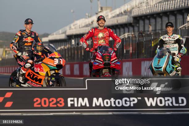 Pedro Acosta of Spain and Red Bull KTM Ajo, Francesco Bagnaia of Italy and Ducati Lenovo Team and Jaime Masia of Spain and Leopard Racing pose on the...