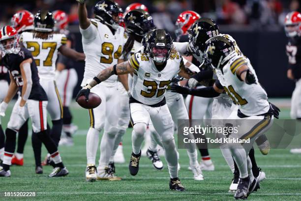 Tyrann Mathieu of the New Orleans Saints celebrates after intercepting the ball in the third quarter of the game against the Atlanta Falcons at...