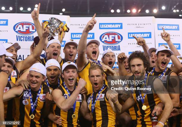 The Box Hill Hawks celebrate with the Premiership Cup after winning the VFL Grand Final match between the Box Hill Hawks and the Geelong Cats at...