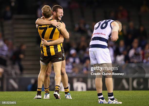 Mitch Hallahan and Michael Osborne of the Hawks celebrate winning the VFL Grand Final match between the Box Hill Hawks and the Geelong Cats at Etihad...