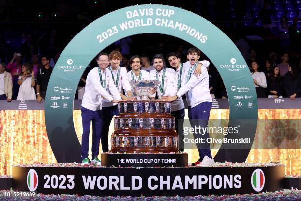 Filippo Volandri, Jannik Sinner, Lorenzo Musetti, Matteo Arnaldi, Lorenzo Sonego and Simone Bolelli of Italy celebrate with the Davis Cup Trophy...