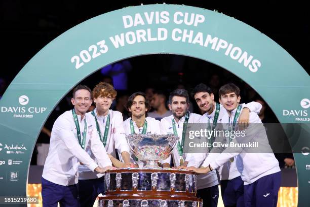 Filippo Volandri, Jannik Sinner, Lorenzo Musetti, Matteo Arnaldi, Lorenzo Sonego and Simone Bolelli of Italy celebrate with the Davis Cup Trophy...