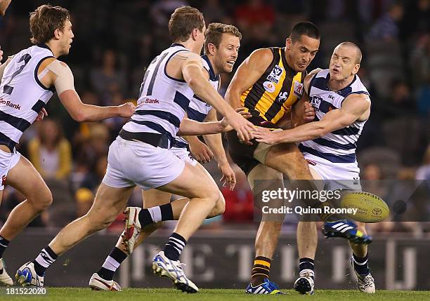 Shane Savage of the Hawks kicks during the VFL Grand Final match between the Box Hill Hawks and the Geelong Cats at Etihad Stadium on September 22,...