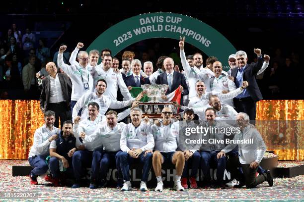 Filippo Volandri, Jannik Sinner, Lorenzo Musetti, Matteo Arnaldi, Lorenzo Sonego and Simone Bolelli of Italy celebrate with team Italy and the Davis...