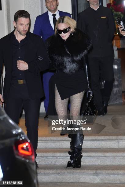 Madonna is seen leaving Hotel Palazzo Parigi on November 26, 2023 in Milan, Italy.