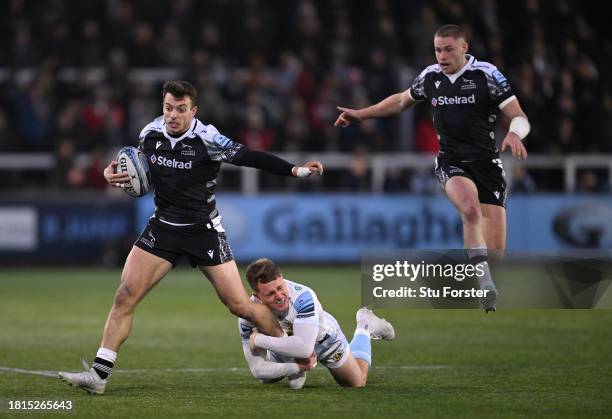 Falcons wing Adam Radwan breaks the tackle of Exeter player Will Haydon-Wood as Tom Penny comes in for support during the Gallagher Premiership Rugby...