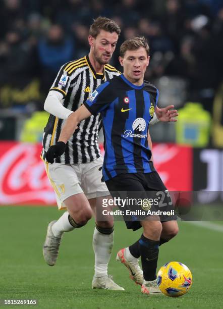 Nicolo Barella of FC Internazionale is challenged by Daniele Rugani of Juventus during the Serie A TIM match between Juventus and FC Internazionale...