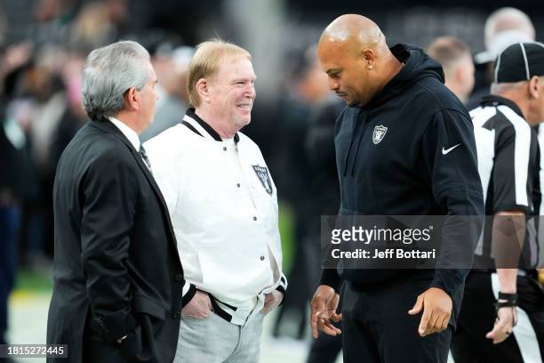 Las Vegas Raiders owner Mark Davis talks with Interim head coach Antonio Pierce of the Las Vegas Raiders prior to a game against the Kansas City...