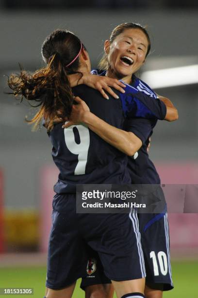 Homare Sawa and Nahomi Kawasumi of Japan celebrate the second goal during the Women's international friendly match between Japan and Nigeria at...