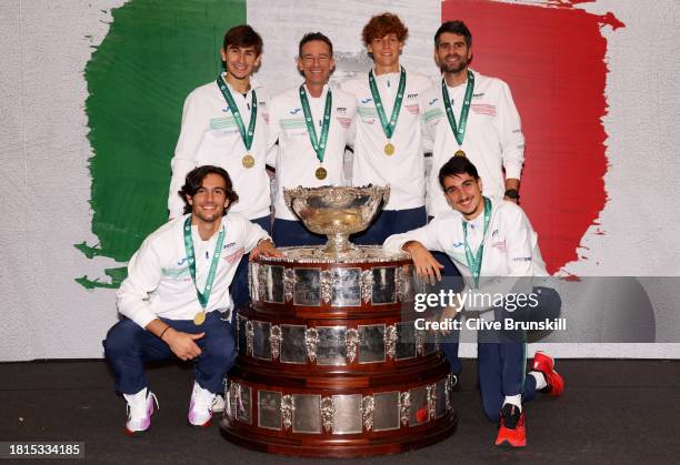 Lorenzo Musetti, Matteo Arnaldi, Filippo Volandri, Jannik Sinner, Simone Bolelli and Lorenzo Sonego of Italy pose for a photo with the Davis Cup...