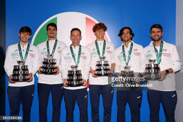 Matteo Arnaldi, Lorenzo Sonego, Filippo Volandri, Jannik Sinner, Lorenzo Musetti and Simone Bolelli of Italy pose for a photo with their Davis Cup...
