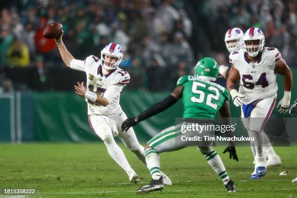 Zach Cunningham of the Philadelphia Eagles attempts to tackle Josh Allen of the Buffalo Bills during the second quarter at Lincoln Financial Field on...