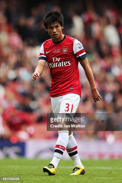 Ryo Miyaichi of Arsenal looks on during the Barclays Premier League match between Arsenal and Stoke City at Emirates Stadium on September 22, 2013 in...