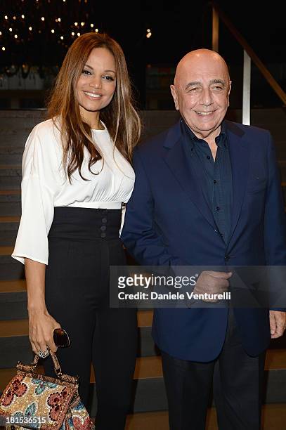 Helga Costa and Adriano Galliani arrive at the Dolce & Gabbana show as a part of Milan Fashion Week Womenswear Spring/Summer 2014 on September 22,...