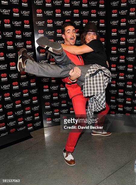 Paul the Web Guy and singer Zac Hanson arrive at the iHeartRadio Music Festival official closing party at the Light Nightclub at the Mandalay Bay...
