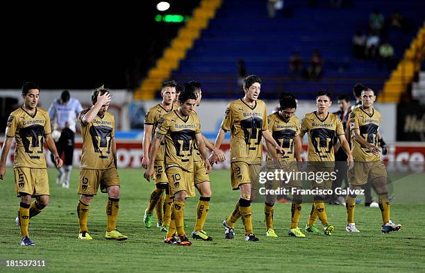 Team of Pumas leaves the field during a match between Atlante and Pumas UNAM as part of the Apertura 2013 Liga MX at Olympic Stadium Andres Quintana...