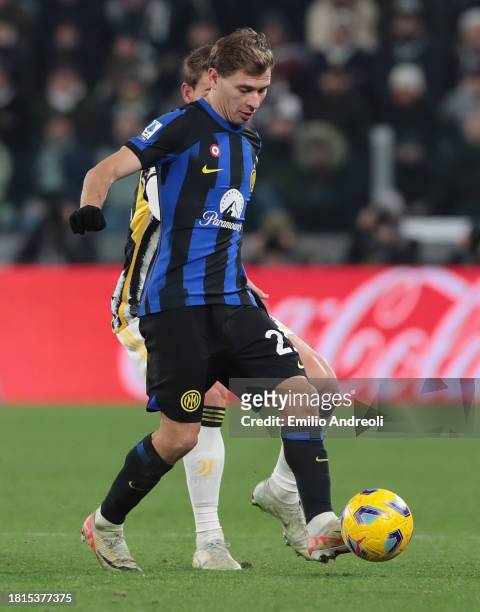 Nicolo Barella of FC Internazionale is challenged by Daniele Rugani of Juventus during the Serie A TIM match between Juventus and FC Internazionale...