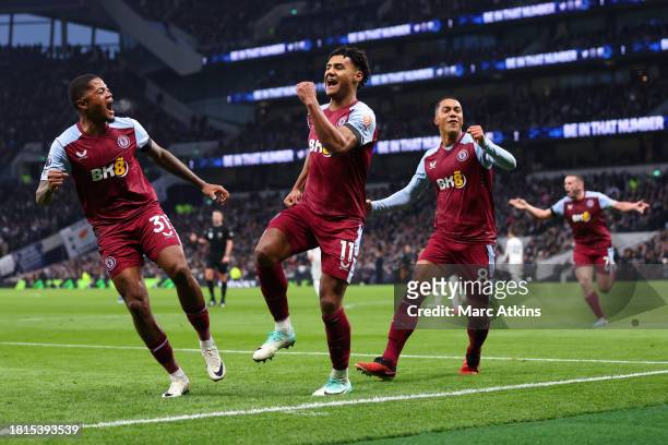 Ollie Watkins celebrates scoring the winning goal with Leon Bailey and Youri Tielemans of Aston Villa during the Premier League match between...