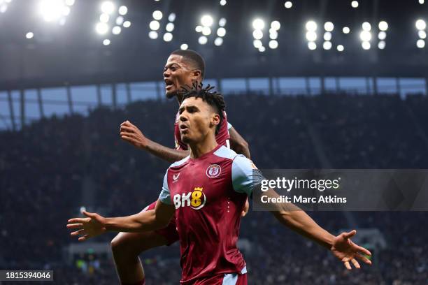 Ollie Watkins celebrates scoring the winning goal with Leon Bailey of Aston Villa during the Premier League match between Tottenham Hotspur and Aston...