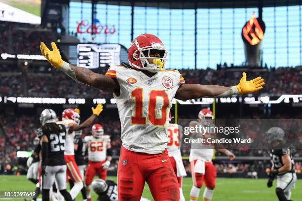 Isiah Pacheco of the Kansas City Chiefs celebrates after a third quarter touchdown against the Las Vegas Raiders at Allegiant Stadium on November 26,...